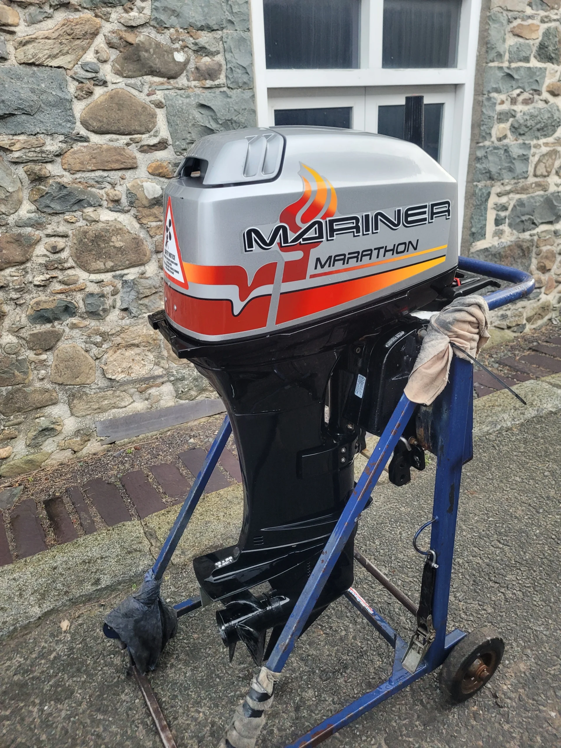 Used 40hp mariner marathon, two stroke,manual tilt, short shaft, on tilelr